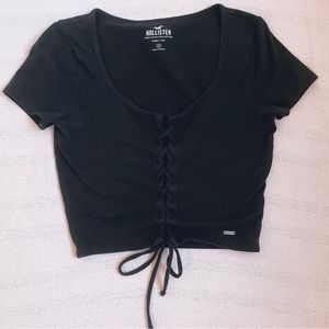 small hollister black cropped baby tee with laced up front
